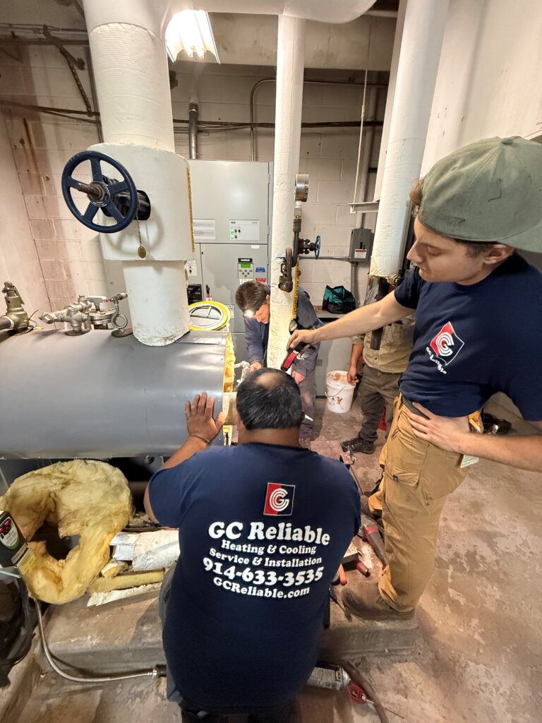 multiple techs working in mechanical/boiler room